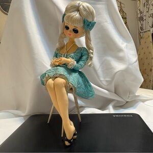 Vintage Big Eyed Doll from the 60’s with Teal Dress and Bow 15 inches tall.
